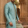 Turquoise Sherwani with Subtle Golden Embroidery Ivory Sherwani